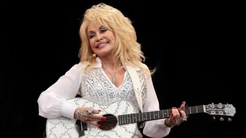 Tributes pour in for Dolly Parton